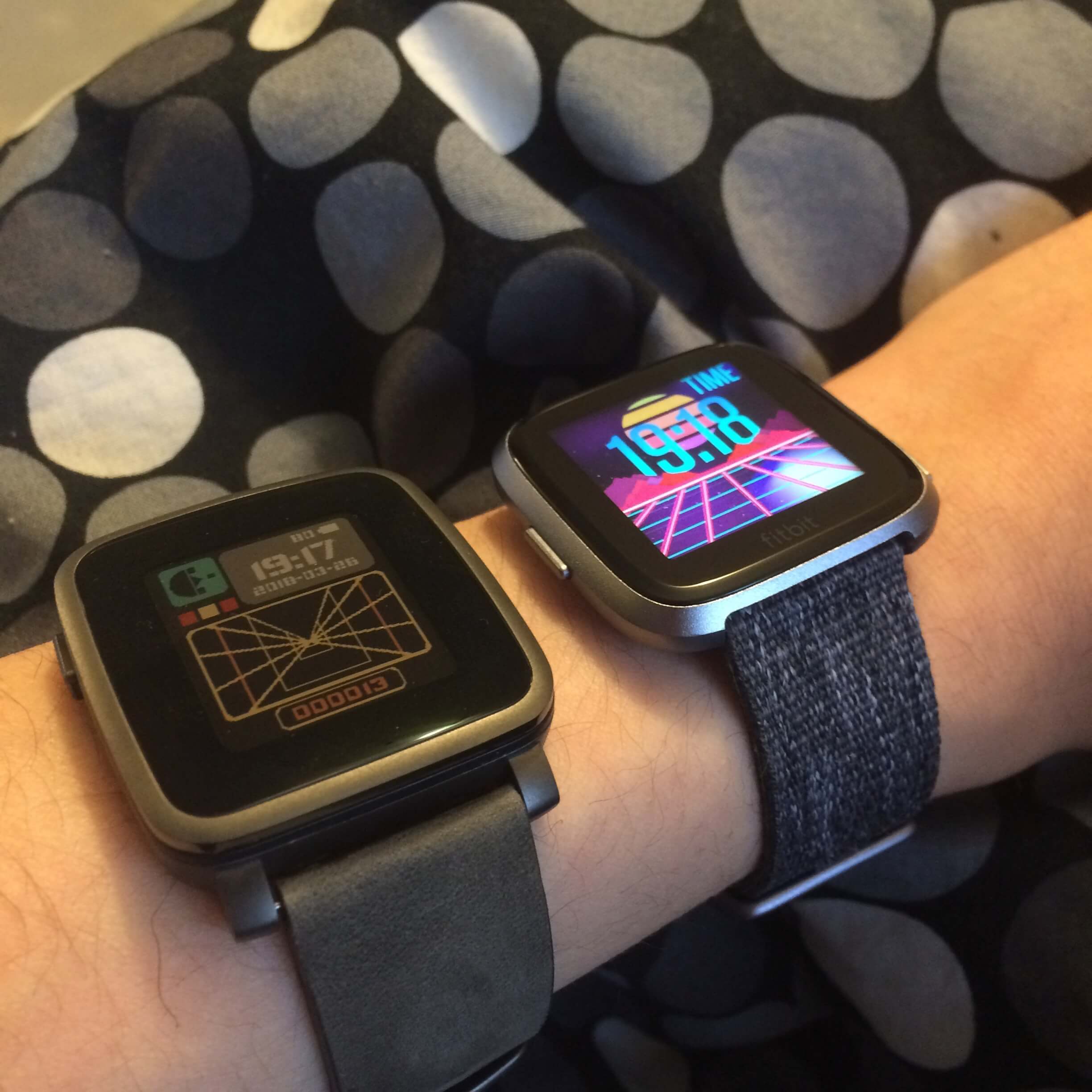 Fitbit Versa on wrist compared to Pebble Time Steel