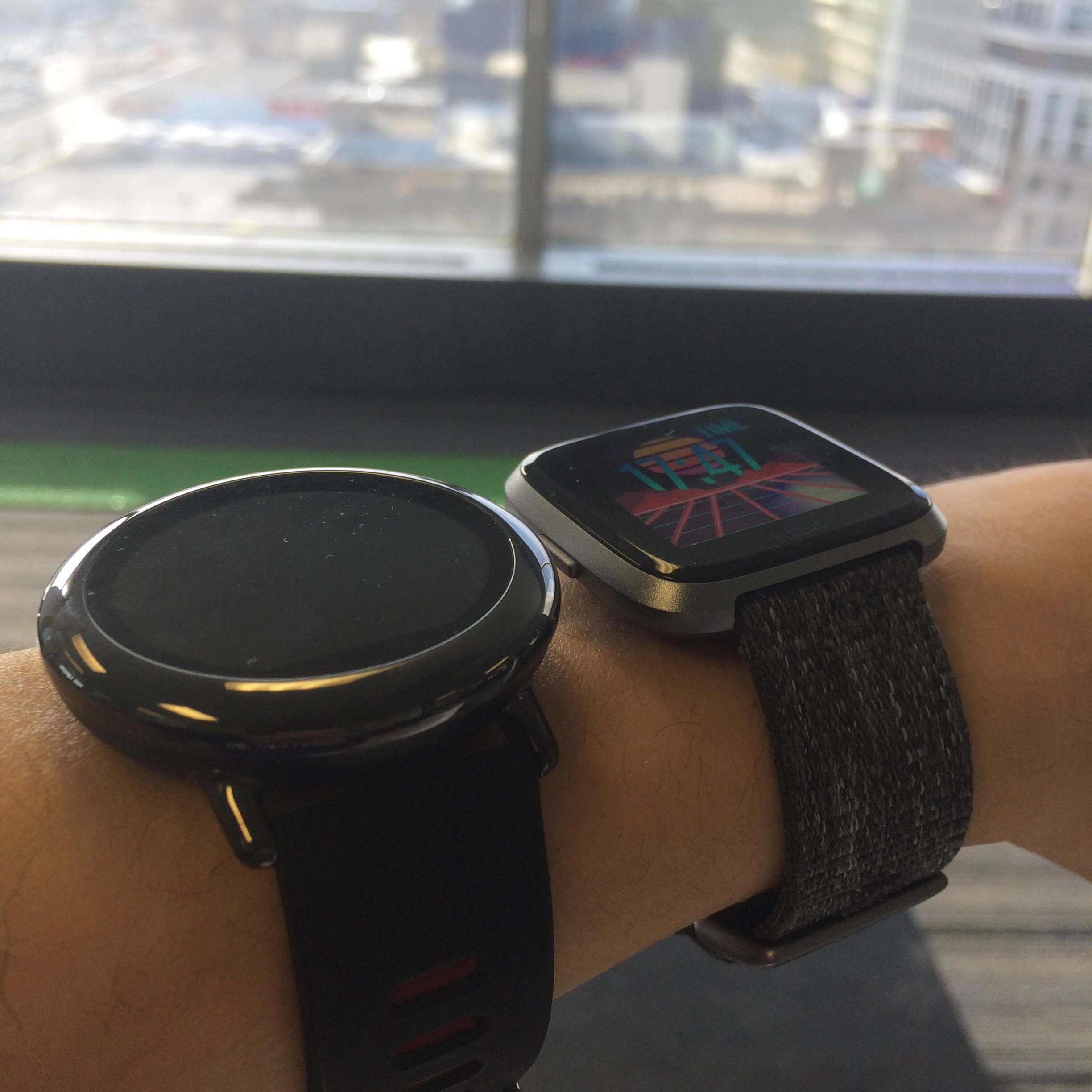 Fitbit Versa on wrist compared to Amazfit Pace