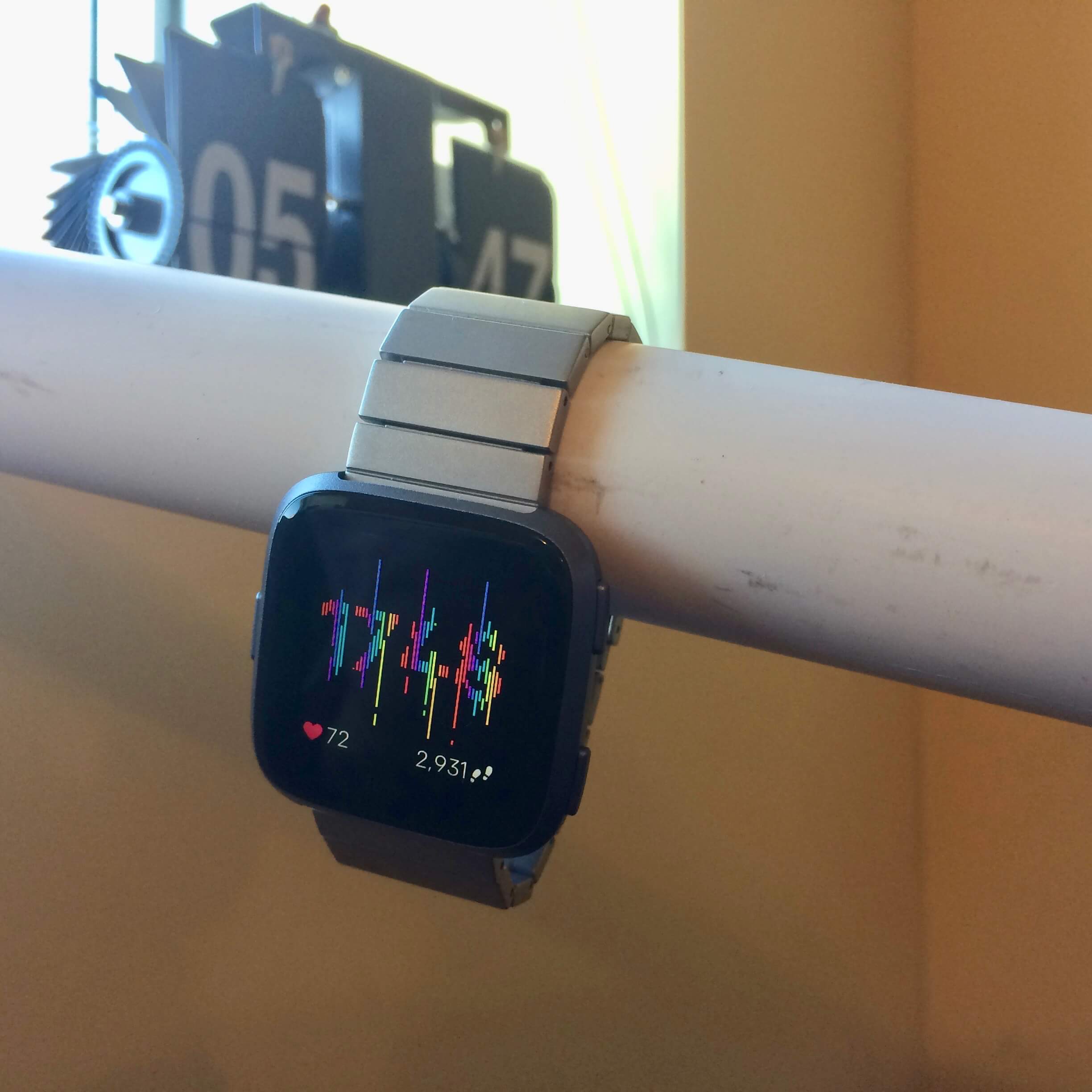 Fitbit Versa with Glitch clock face
